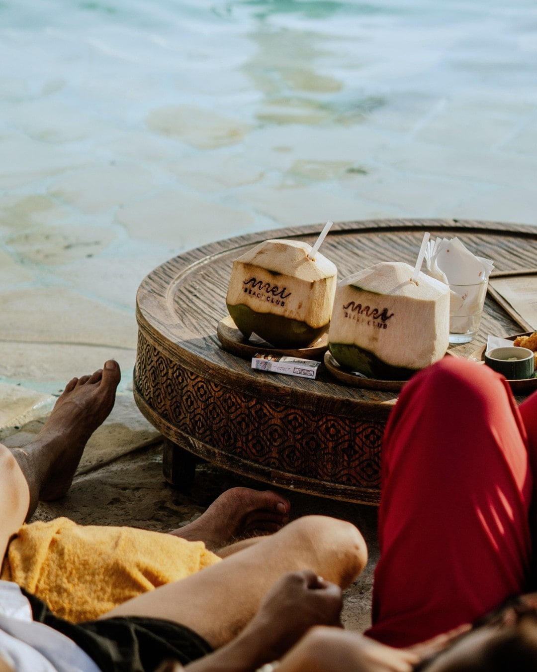  two fresh coconuts on the table